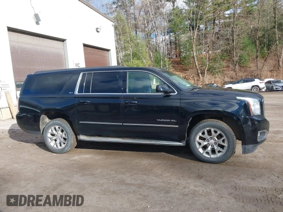 2015 GMC Yukon XL SLT with VIN 1GKS2HKC9FR159164, listed as a IAAI auction lot 41235420 with 136,730 mi miles. Bid and sale history available at carsss.com. Image 13.