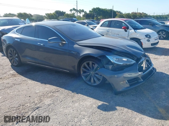 2014 Tesla Model S 60 with VIN 5YJSA1H1XEFP31911, listed as a IAAI auction lot 42029215 with Not Provided miles and . Bid and sale history available at DreamBid. Image 1.