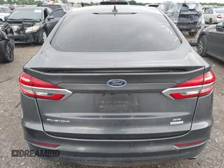 2020 Ford Fusion SE z VIN 3FA6P0HD5LR198744, wystawiony jako IAAI lot #42177820 z przebiegiem 97 520 mil mil oraz . Historia ofert i sprzedaży dostępna na DreamBid. Obrazek 16.