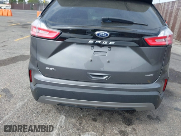 2023 Ford Edge SEL z VIN 2FMPK4J98PBA03830, wystawiony jako IAAI lot #41992054 z przebiegiem 21 081 mil mil oraz . Historia ofert i sprzedaży dostępna na DreamBid. Obrazek 16.