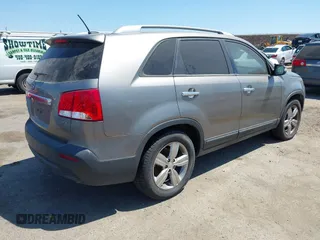 2012 Kia Sorento EX with VIN 5XYKU3A60CG305675, listed as a IAAI auction lot 42647223 with 174,447 mi miles and . Bid and sale history available at DreamBid. Image 4.