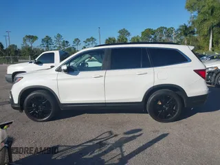 2021 Honda Pilot Special Edition with VIN 5FNYF5H24MB037208, listed as a IAAI auction lot 41319708 with 64,633 mi miles and . Bid and sale history available at DreamBid. Image 14.