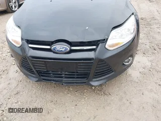 2012 Ford Focus SEL with VIN 1FAHP3M28CL336001, listed as a IAAI auction lot 40876771 with 147,017 mi miles. Bid and sale history available at carsss.com. Image 6.