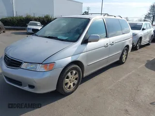 2004 Honda Odyssey EX-L with VIN 5FNRL18964B125664, listed as a IAAI auction lot 41531606 with 327,493 mi miles and . Bid and sale history available at DreamBid. Image 2.