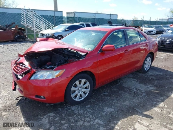 2007 Toyota Camry CE with VIN JTNBE46K573115563, listed as a IAAI auction lot 41971937 with 132,427 mi miles. Bid and sale history available at carsss.com. Image 2.