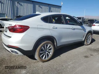 2019 BMW X6 sDrive35i z VIN 5UXKU0C55K0G92734, wystawiony jako Copart lot #81233084 z przebiegiem 60 365 mil mil oraz Szkoda całkowita • Salvage title. Historia ofert i sprzedaży dostępna na DreamBid. Obrazek 3.