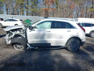 2024 Cadillac XT4 AWD Premium Luxury with VIN 1GYFZDR41RF206526, listed as a IAAI auction lot 41663532 with 5,070 mi miles and . Bid and sale history available at carsss.com. Image 14.
