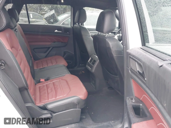 2021 Volkswagen Atlas SEL Premium with VIN 1V2TC2CAXMC214243, listed as a IAAI auction lot 41200408 with 54,902 mi miles and . Bid and sale history available at DreamBid. Image 8.