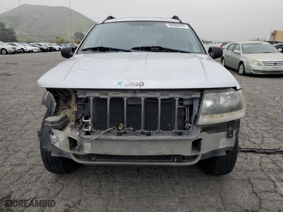 2004 Jeep Grand Cherokee Laredo with VIN 1J4GX48S64C151124, listed as a Copart auction lot 52669445 with 152,970 mi miles and Salvage Title. Bid and sale history available at carsss.com. Image 5.