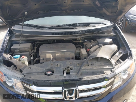 2015 Honda Odyssey EX-L z VIN 5FNRL5H62FB008681, wystawiony jako IAAI lot #42060381 z przebiegiem 128 372 mil mil oraz . Historia ofert i sprzedaży dostępna na DreamBid. Obrazek 10.