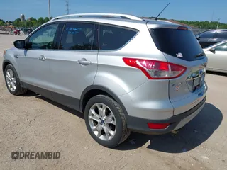 2015 Ford Escape Titanium with VIN 1FMCU9J94FUA65188, listed as a IAAI auction lot 42516728 with 65,969 mi miles and . Bid and sale history available at DreamBid. Image 3.