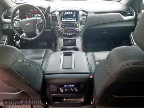 2020 Chevrolet Tahoe LT with VIN 1GNSCBKC5LR203301, listed as a Copart auction lot 57071315 with 106,376 mi miles and Salvage title. Bid and sale history available at DreamBid. Image 8.