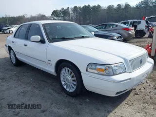 2009 Mercury Grand Marquis LS z VIN 2MEHM75V69X627304, wystawiony jako IAAI lot #41623041 z przebiegiem 137 970 mil mil oraz . Historia ofert i sprzedaży dostępna na DreamBid. Obrazek 1.