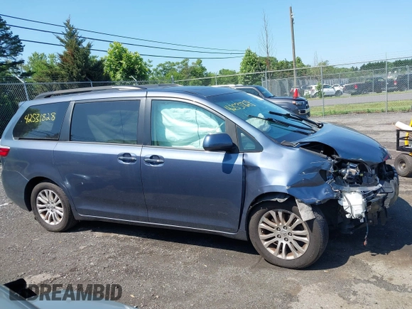 2015 Toyota Sienna XLE with VIN 5TDYK3DC0FS649998, listed as a IAAI auction lot 42531828 with 111,539 mi miles and . Bid and sale history available at DreamBid. Image 14.
