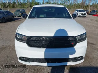 2015 Dodge Durango R/T with VIN 1C4SDHCT7FC873768, listed as a IAAI auction lot 41814710 with 130,237 mi miles and . Bid and sale history available at DreamBid. Image 6.