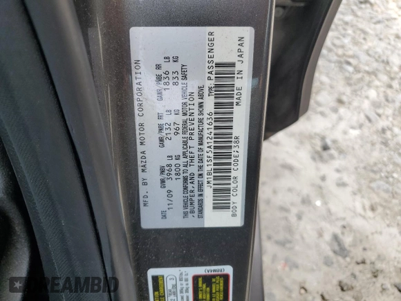 2010 Mazda Mazda3 i Touring with VIN JM1BL1SF5A1241636, listed as a Copart auction lot 52624185 with 96,466 mi miles and Salvage Title. Bid and sale history available at carsss.com. Image 13.