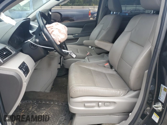 2014 Honda Odyssey EX-L with VIN 5FNRL5H68EB098207, listed as a Copart auction lot 66700024 with 161,701 mi miles and Salvage Title. Bid and sale history available at DreamBid. Image 7.