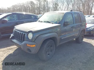 2002 Jeep Liberty Sport with VIN 1J4GL48KX2W319774, listed as a IAAI auction lot 41907101 with Not Provided miles. Bid and sale history available at carsss.com. Image 2.
