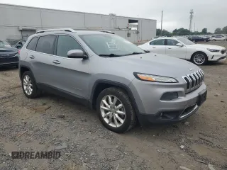 2014 Jeep Cherokee Limited with VIN 1C4PJLDS0EW241327, listed as a Copart auction lot 59440245 with 73,623 mi miles and Salvage title. Bid and sale history available at DreamBid. Image 4.