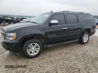 2013 Chevrolet Suburban LT with VIN 1GNSKJE78DR330458, listed as a Copart auction lot 56143205 with 202,809 mi miles and Clean Title. Bid and sale history available at DreamBid. Image 1.