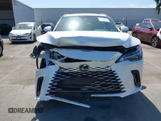 2024 Lexus RX 350h with VIN 2T2BBMCA2RC041498, listed as a IAAI auction lot 42267376 with 14,263 mi miles and . Bid and sale history available at DreamBid. Image 13.