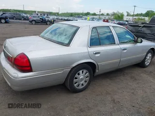 2003 Mercury Grand Marquis LS Premium with VIN 2MEFM75W83X686572, listed as a IAAI auction lot 42208087 with 93,608 mi miles and . Bid and sale history available at DreamBid. Image 4.