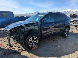 2015 Jeep Cherokee Trailhawk with VIN 1C4PJMBS6FW778665, listed as a Copart auction lot 48158035 with 107,638 mi miles and Salvage Title. Bid and sale history available at carsss.com. Image 1.