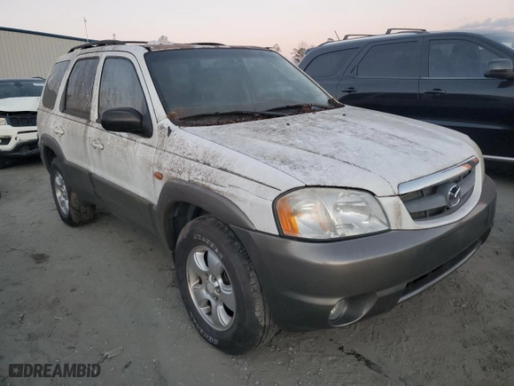 2003 Mazda Tribute LX with VIN 4F2YZ94133KM20084, listed as a Copart auction lot 82598104 with 216,848 mi miles and Salvage Title. Bid and sale history available at carsss.com. Image 4.