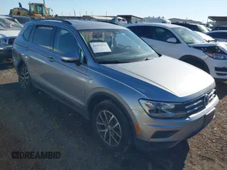 2020 Volkswagen Tiguan SE with VIN 3VV2B7AX4LM081188, listed as a IAAI auction lot 41655478 with 63,593 mi miles and . Bid and sale history available at DreamBid. Image 1.