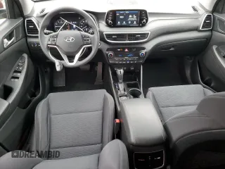 2019 Hyundai Tucson Sport with VIN KM8J33AL0KU875219, listed as a Copart auction lot 86816254 with 82,829 mi miles and Salvage Title. Bid and sale history available at carsss.com. Image 8.