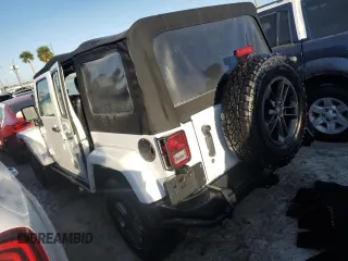 2018 Jeep Wrangler JK Unlimited Freedom Edition with VIN 1C4BJWDG2JL805031, listed as a Copart auction lot 73987524 with 0 mi miles and Non Repairable. Bid and sale history available at carsss.com. Image 2.