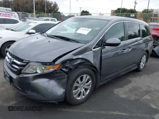 2014 Honda Odyssey EX-L with VIN 5FNRL5H64EB055807, listed as a IAAI auction lot 41760758 with 144,346 mi miles and . Bid and sale history available at carsss.com. Image 2.