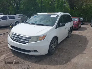 2012 Honda Odyssey EX-L with VIN 5FNRL5H63CB117341, listed as a IAAI auction lot 42197815 with 256,544 mi miles and . Bid and sale history available at DreamBid. Image 17.