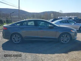 2017 Ford Fusion SE z VIN 3FA6P0HD8HR211638, wystawiony jako IAAI lot #42029399 z przebiegiem 90 262 mil mil oraz . Historia ofert i sprzedaży dostępna na DreamBid. Obrazek 13.
