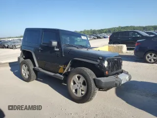 2010 Jeep Wrangler Sahara z VIN 1J4AA5D1XAL227305, wystawiony jako Copart lot #70165554 z przebiegiem Nie podano mil oraz Szkoda całkowita • Salvage title. Historia ofert i sprzedaży dostępna na DreamBid. Obrazek 4.