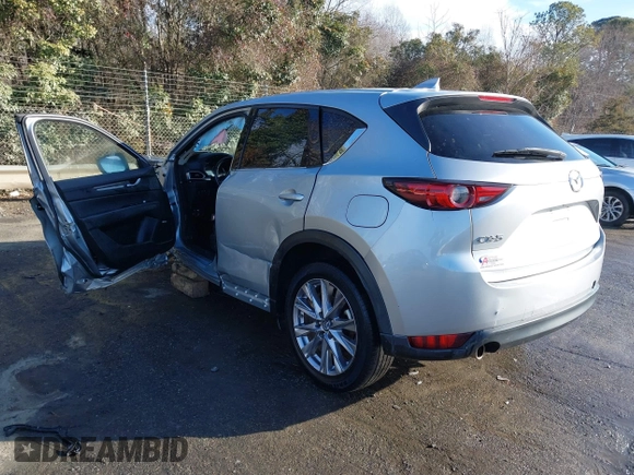 2020 Mazda CX-5 Grand Touring z VIN JM3KFADM0L0738337, wystawiony jako IAAI lot #41485078 z przebiegiem Nie podano mil oraz . Historia ofert i sprzedaży dostępna na DreamBid. Obrazek 3.