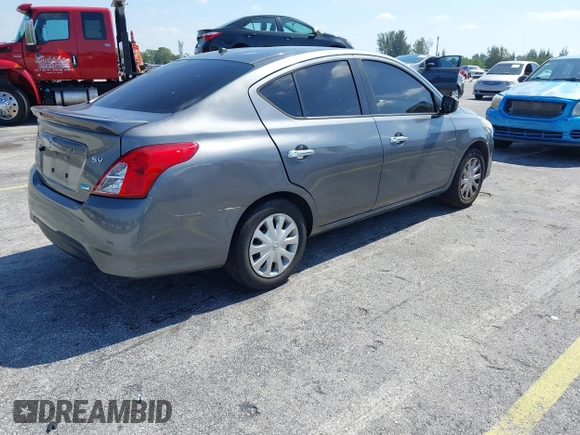 2016 Nissan Versa S Plus with VIN 3N1CN7AP6GL901666, listed as a IAAI auction lot 42126865 with 158,067 mi miles. Bid and sale history available at carsss.com. Image 4.