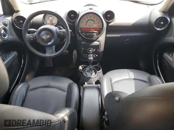 2014 MINI Countryman S with VIN WMWZC3C57EWP25099, listed as a Copart auction lot 62646555 with 153,059 mi miles and Salvage title. Bid and sale history available at DreamBid. Image 8.