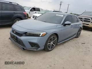 2024 Honda Civic Touring z VIN 2HGFE1F94RH331066, wystawiony jako Copart lot #53402205 z przebiegiem 13 872 mil mil oraz Szkoda całkowita • Salvage title. Historia ofert i sprzedaży dostępna na DreamBid. Obrazek 1.