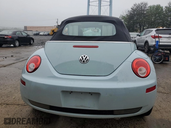 2010 Volkswagen Beetle with VIN 3VWRG3AL7AM006001, listed as a Copart auction lot 56973285 with Not provided miles and Salvage title. Bid and sale history available at DreamBid. Image 6.