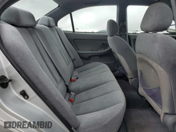 2004 Hyundai Elantra GLS z VIN KMHDN46D34U859307, wystawiony jako Copart lot #53847235 z przebiegiem 91 939 mil mil oraz Szkoda całkowita • Salvage title. Historia ofert i sprzedaży dostępna na DreamBid. Obrazek 10.