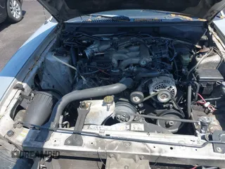 2000 Ford Mustang with VIN 1FAFP4444YF187140, listed as a IAAI auction lot 42002117 with 1 mi miles. Bid and sale history available at carsss.com. Image 10.
