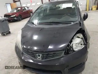 2013 Honda Fit Sport z VIN JHMGE8H56DC019556, wystawiony jako IAAI lot #41140755 z przebiegiem Nie podano mil oraz . Historia ofert i sprzedaży dostępna na DreamBid. Obrazek 11.
