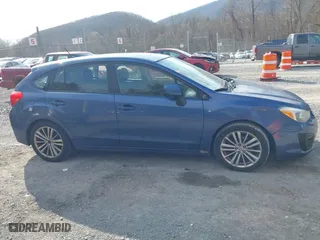 2012 Subaru Impreza Wagon 2.0i Premium with VIN JF1GPAD6XCH212222, listed as a IAAI auction lot 41899489 with 136,410 mi miles. Bid and sale history available at carsss.com. Image 13.