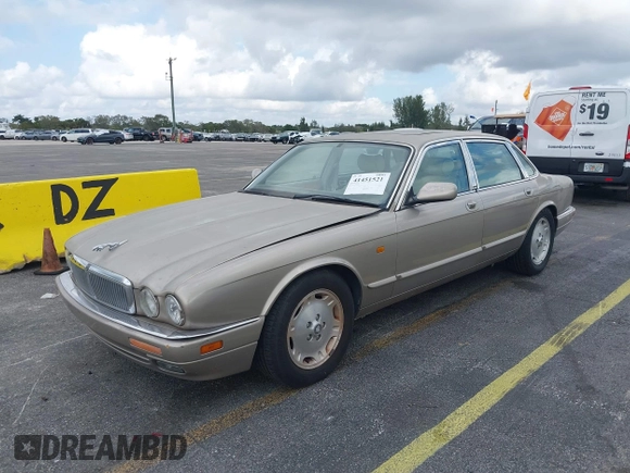 1997 Jaguar XJ with VIN SAJHX1243VC811786, listed as a IAAI auction lot 41451521 with Not provided miles and . Bid and sale history available at DreamBid. Image 2.