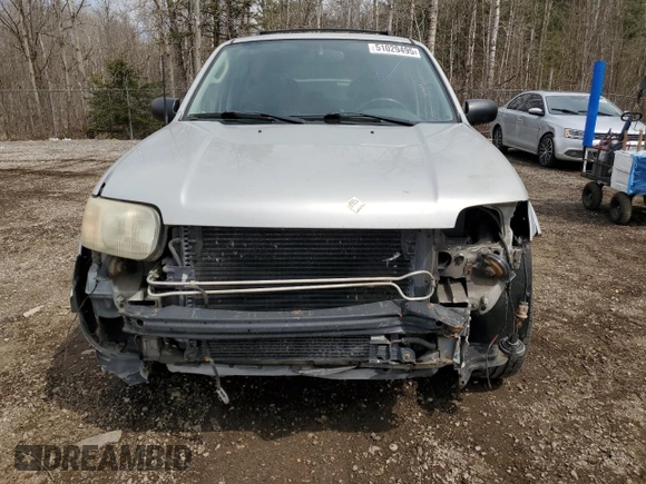 2003 Ford Escape Limited z VIN 1FMCU941X3KC33512, wystawiony jako Copart lot #51029495 z przebiegiem 146 616 mil mil oraz Szkoda całkowita • Salvage title. Historia ofert i sprzedaży dostępna na DreamBid. Obrazek 5.