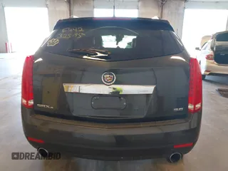2014 Cadillac SRX Premium Collection z VIN 3GYFNGE38ES606731, wystawiony jako IAAI lot #41844450 z przebiegiem 156 541 mil mil oraz . Historia ofert i sprzedaży dostępna na DreamBid. Obrazek 16.