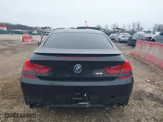 2014 BMW M6 with VIN WBSLX9C58ED160558, listed as a IAAI auction lot 41553209 with 154,789 mi miles. Bid and sale history available at carsss.com. Image 17.