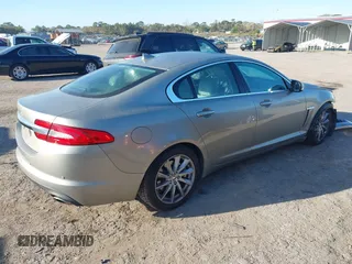 2013 Jaguar XF I4 RWD with VIN SAJWA0ES3DPU01767, listed as a IAAI auction lot 41704883 with 54,797 mi miles. Bid and sale history available at carsss.com. Image 4.