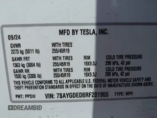 2024 Tesla Model Y with VIN 7SAYGDED8RF201955, listed as a IAAI auction lot 42700483 with 11,898 mi miles and . Bid and sale history available at DreamBid. Image 9.
